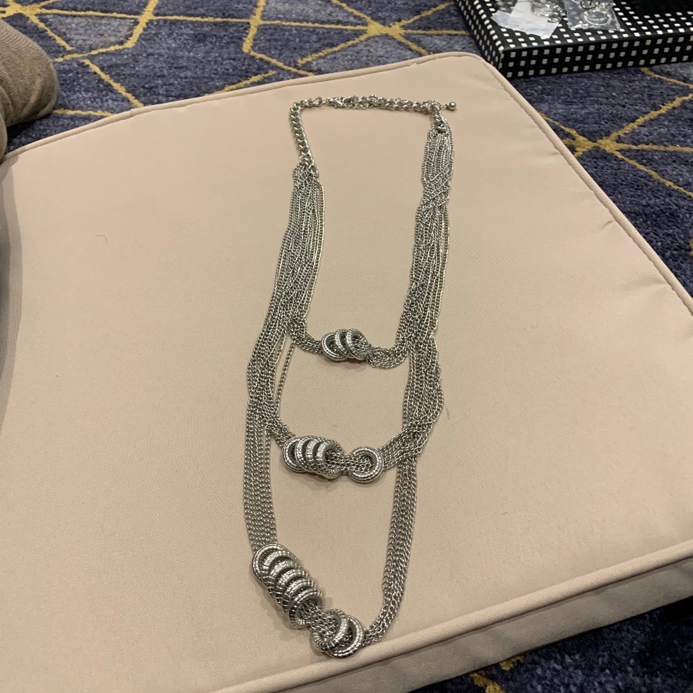 Long Multichain Silvertone Necklace w/ Circular Rings on 3 Levels.  14 1/2” L